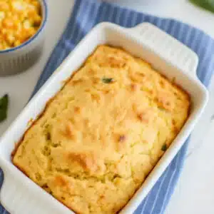 Jalapeno Cornbread Jiffy – The Best Spicy Twist to Classic Comfort 14 Freshly baked jalapeno cornbread jiffy in a white ceramic dish