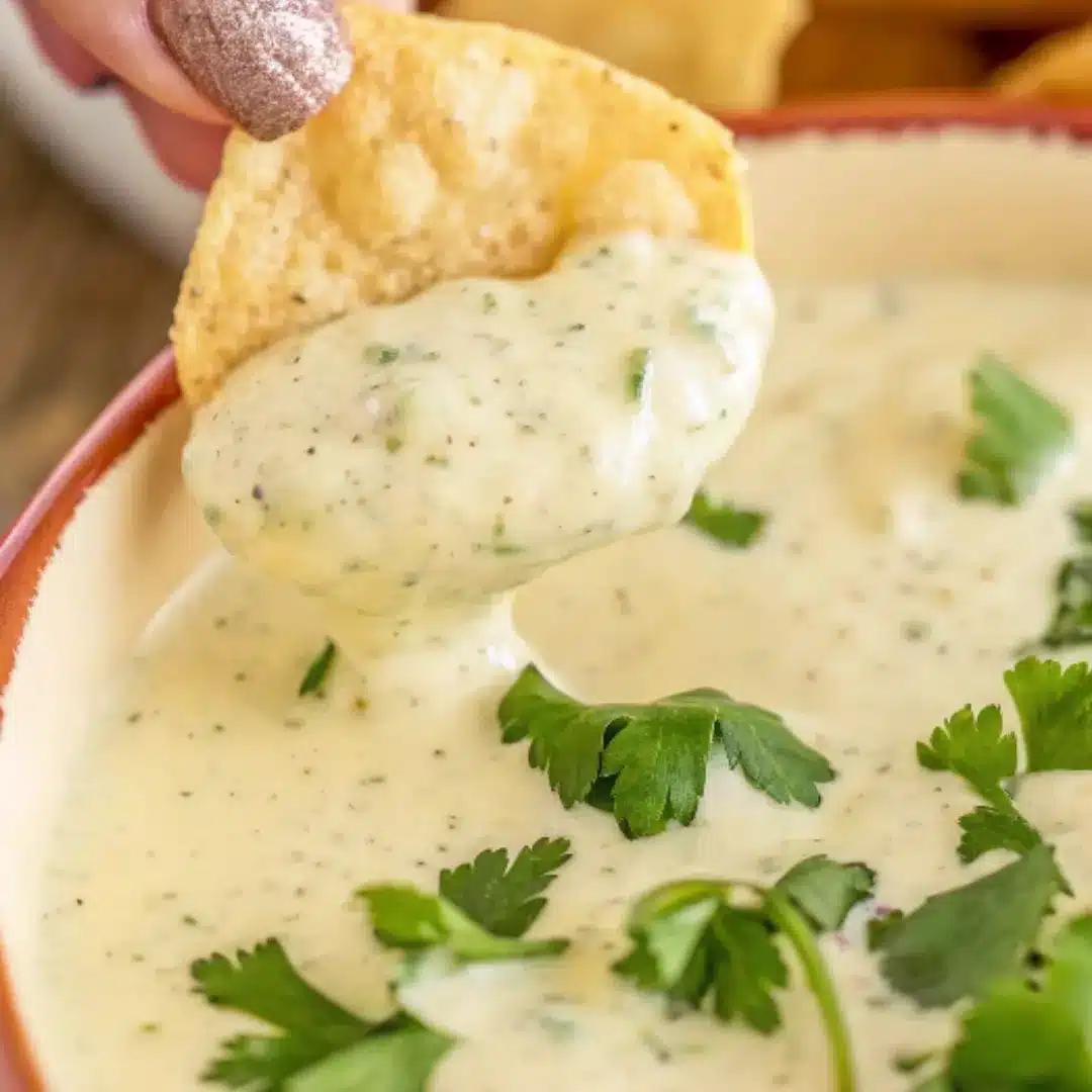 Jalapeño Ranch Dip – Cool, Creamy, and Spicy Creamy jalapeño ranch dip with cilantro, scooped with a tortilla chip