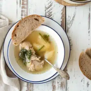 Jewish Chicken Soup Recipe – The Heart of Every Jewish Kitchen 20 Jewish chicken soup recipe with chicken, herbs, and rustic bread